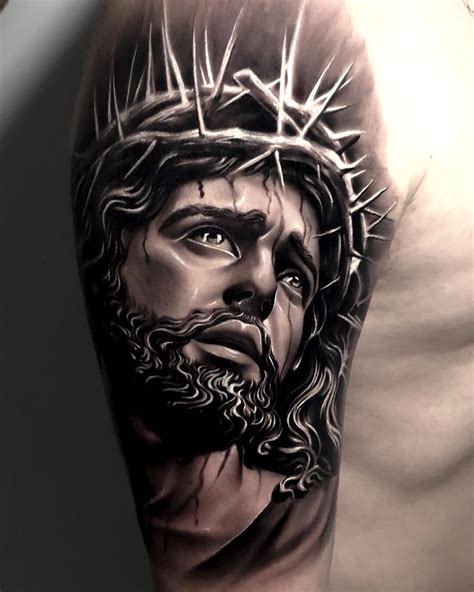 Cristo tattoo antebrazo